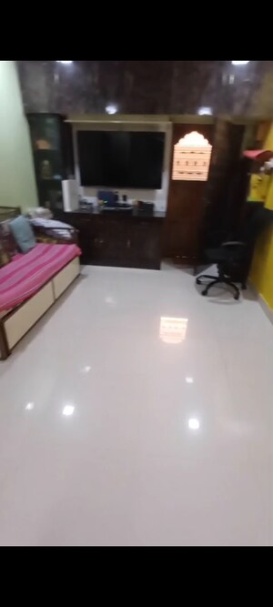 Living Room in 1 BHK Apartment at Krishna Nagari Niwara CHS, Goregaon East – for Sale