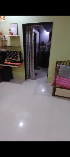 Living Room in 1 BHK Apartment at Krishna Nagari Niwara CHS, Goregaon East – for Sale