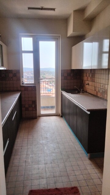 Kitchen in 3 BHK Apartment at Pareena The Elite Residences, Sector 99 – for Rent