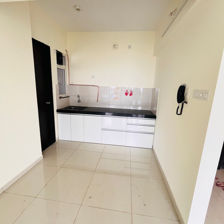 Kitchen, kolte-patil-life-republic 2 Bedroom 650 Sq.Ft. Apartment In Marunji Pune 9047338