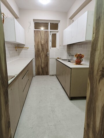 Kitchen in 3 BHK Builder Floor at RPS Palm Drive, Sector 88 – for Rent