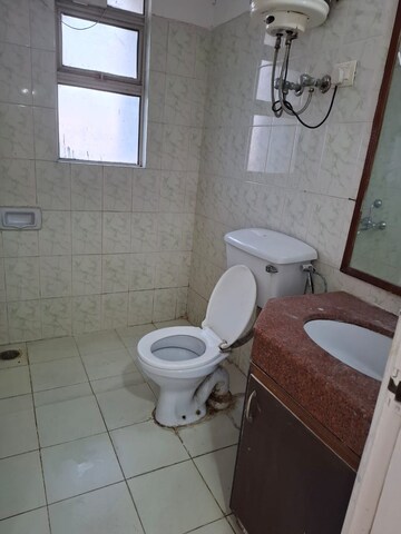 Bathroom in 3 BHK Apartment at Mahindra Luminare, Sector 59 – for Sale