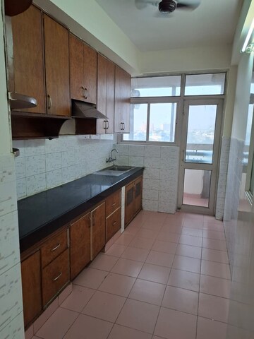 Kitchen in 3 BHK Apartment at Mahindra Luminare, Sector 59 – for Sale