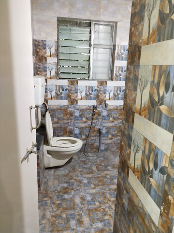 Staircase in 2 BHK Apartment at Nirmiti Ragdari Apartments, Aundh – for Rent