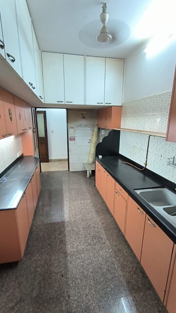 Kitchen in 3 BHK Apartment at Neel Tarang, Dadar West – for Sale