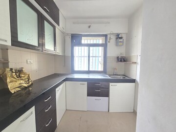 Kitchen in 2 BHK Apartment at Sheth Avalon, Laxmi Nagar – for Rent