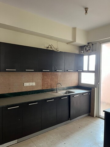 Kitchen in 3 BHK Apartment at Puri Pranayam, Sector 82 – for Sale