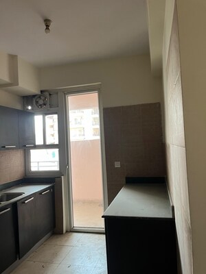 Kitchen in 3 BHK Apartment at Puri Pranayam, Sector 82 – for Sale