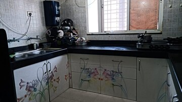 Kitchen in 2 BHK Apartment at Sancheti Eves Garden, Mundhwa – for Rent