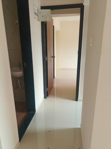 Building Lobby in 1 BHK Apartment at KM Horizon Exotica, Haware City – for Rent