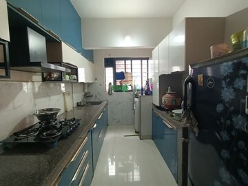 Kitchen in 2 BHK Apartment at Kumar Park Infinia, Fursungi – for Rent