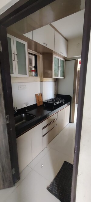 Kitchen in 1 BHK Apartment at Raj Residency Kasarvadavali, Kasarvadavali – for Sale