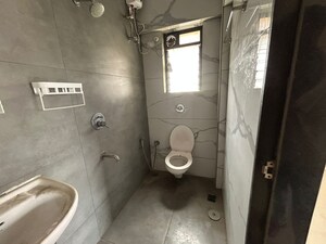 Bathroom in 2 BHK Apartment at Unnathi Woods Phase 1 And 2, Ghodbunder Road – for Sale