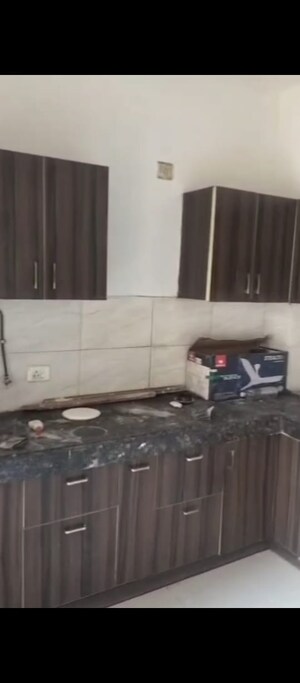 Kitchen in 2 BHK Apartment at Ajnara Le Garden, Sector 16b Greater Noida – for Sale