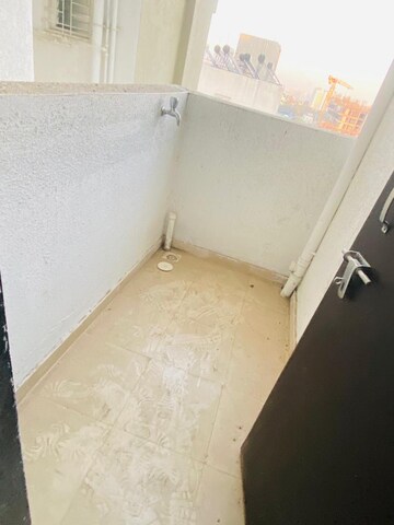 Bathroom in 2 BHK Apartment at Raj Heramba Venkatesh Imperia, Tathawade – for Rent