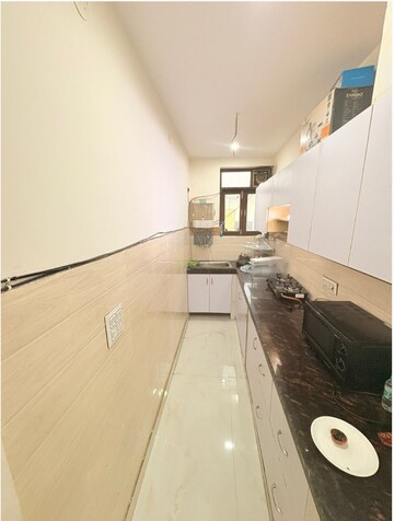 Kitchen in 2 BHK Builder Floor at Khanpur – for Sale