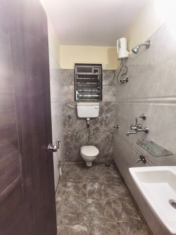 Bathroom in 1 BHK Apartment at Rosa Classique, Kasarvadavali – for Rent