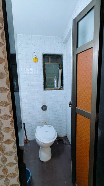 Bathroom in 1 BHK Apartment at Ideal Enclave, Mira Road – for Rent