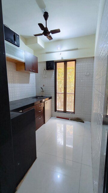 Kitchen in 1 BHK Apartment at Ideal Enclave, Mira Road – for Rent