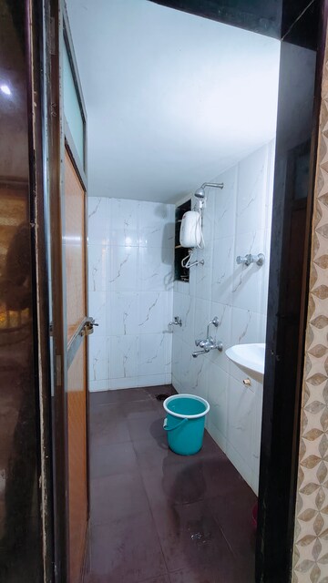 Bathroom in 1 BHK Apartment at Ideal Enclave, Mira Road – for Rent