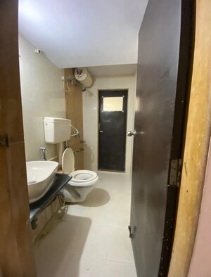 Bathroom in 3 BHK Apartment at Runwal Garden City, Balkum Pada – for Sale