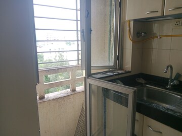 Kitchen in 2.5 BHK Apartment at Siddhanchal CHS, Pawar Nagar – for Rent