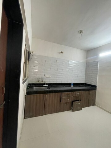 Kitchen in 2 BHK Apartment at GK Dwarka Sai, Rahatani – for Sale