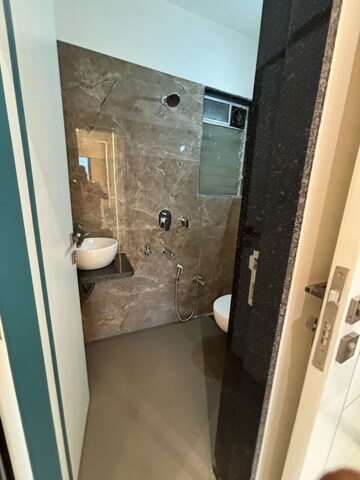 Bathroom in 1 BHK Apartment at Sai Samarth Enclave, Chakki Naka – for Sale
