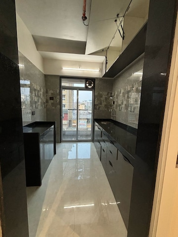 Kitchen in 1 BHK Apartment at Sai Samarth Enclave, Chakki Naka – for Sale