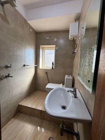 Bathroom in 1 RK Apartment at DLF One Midtown, Moti Nagar – for Rent
