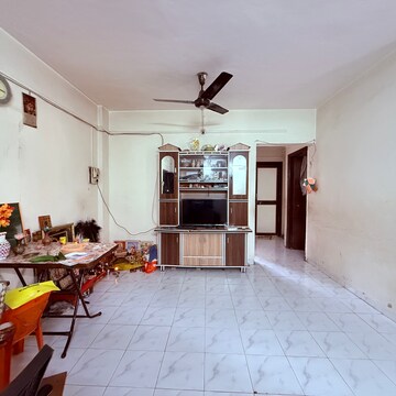 Living Room in 2 BHK Apartment at Chidanand CHS, Sutarwadi – for Rent