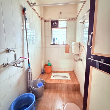 Bathroom in 2 BHK Apartment at Chidanand CHS, Sutarwadi – for Rent