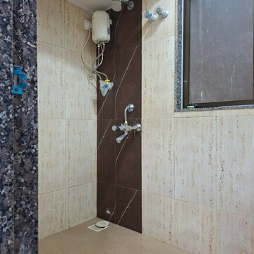 Bathroom in 2 BHK Apartment at Lotus Unity, Versova – for Rent