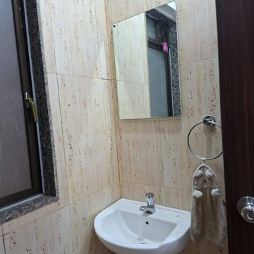 Bathroom in 2 BHK Apartment at Lotus Unity, Versova – for Rent