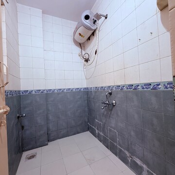 Bathroom in 1 BHK Apartment at Reelicon Felicia, Link Road – for Sale
