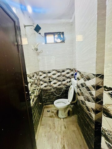 Bathroom in 2 BHK Builder Floor at Dwarka Mor – for Rent