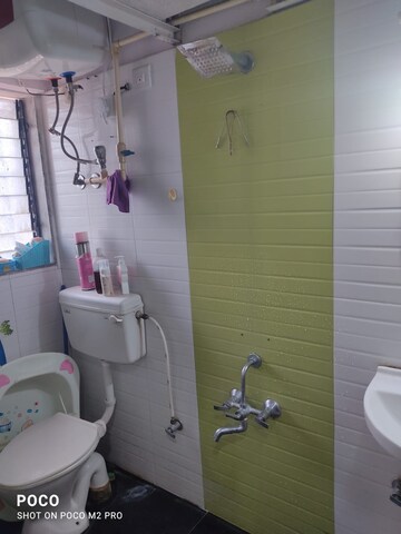 Bathroom in 2 BHK Apartment at Ansal Whispering Meadows, Mulund West – for Rent