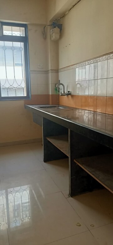 Kitchen in 2 BHK Apartment at Lodha Paradise, Majiwada – for Rent