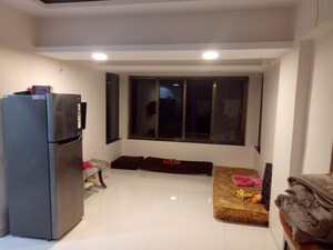 Living Room in 1 BHK Apartment at Lokpuram CHS, Vasant Vihar – for Sale