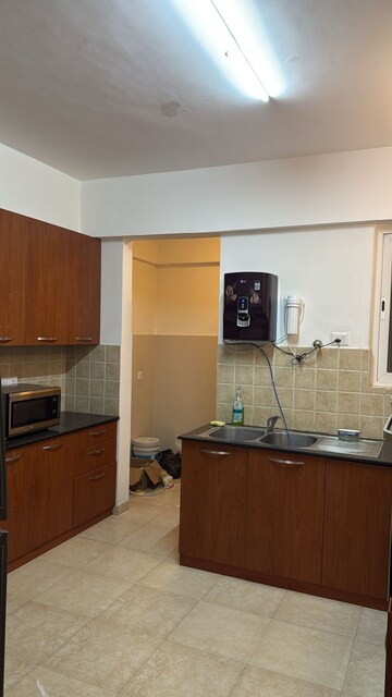 Kitchen in 3 BHK Apartment at Sterling Navorjeet, Ashok Nagar – for Rent