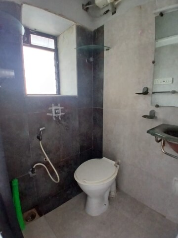 Bathroom in 2 BHK Apartment at Yashodeep Castle Tower, Andheri West – for Rent