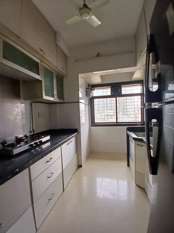 Kitchen in 2 BHK Apartment at Yashodeep Castle Tower, Andheri West – for Rent