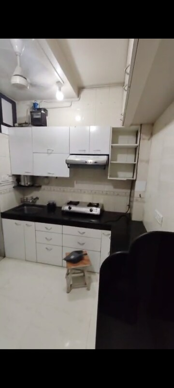 Kitchen in 1 BHK Apartment at Viman Darshan CHS, Andheri East – for Rent