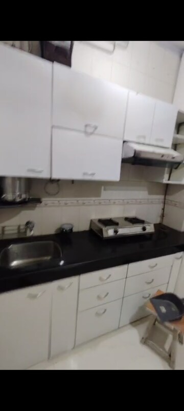 Kitchen in 1 BHK Apartment at Viman Darshan CHS, Andheri East – for Rent