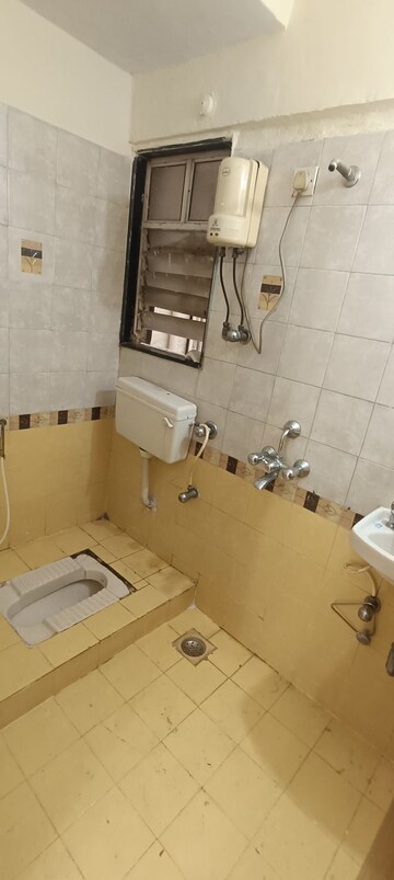 Bathroom in 1 BHK Apartment at Bhoomi Park, Malad West – for Rent