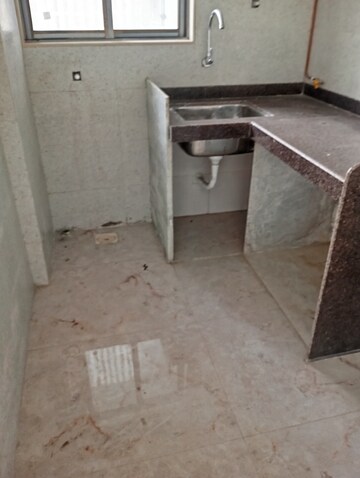 Bathroom in 1 BHK Apartment at Crystal Paradise Residences, Andheri East – for Sale