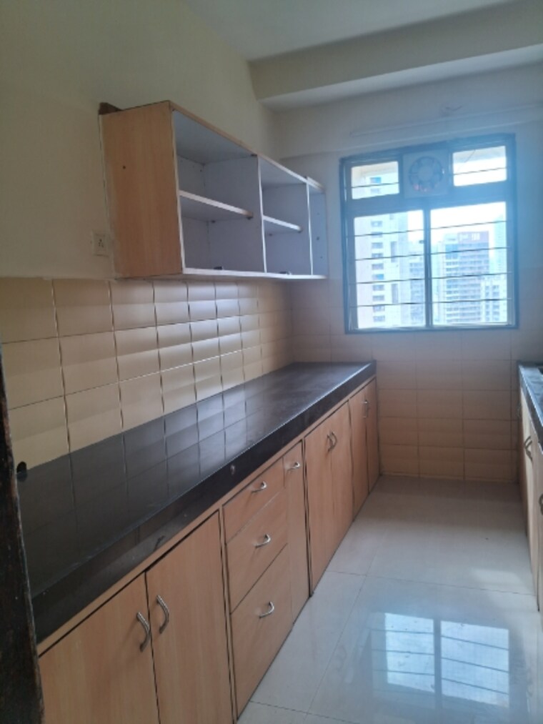 Kitchen, sky-flama 2 Bedroom 705 Sq.Ft. Apartment In Sewri Mumbai 9049544