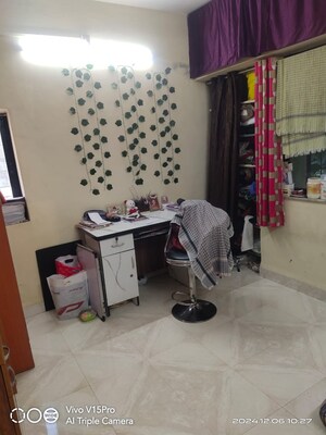 Living Room in 1 BHK Apartment at Karve Nagar – for Sale