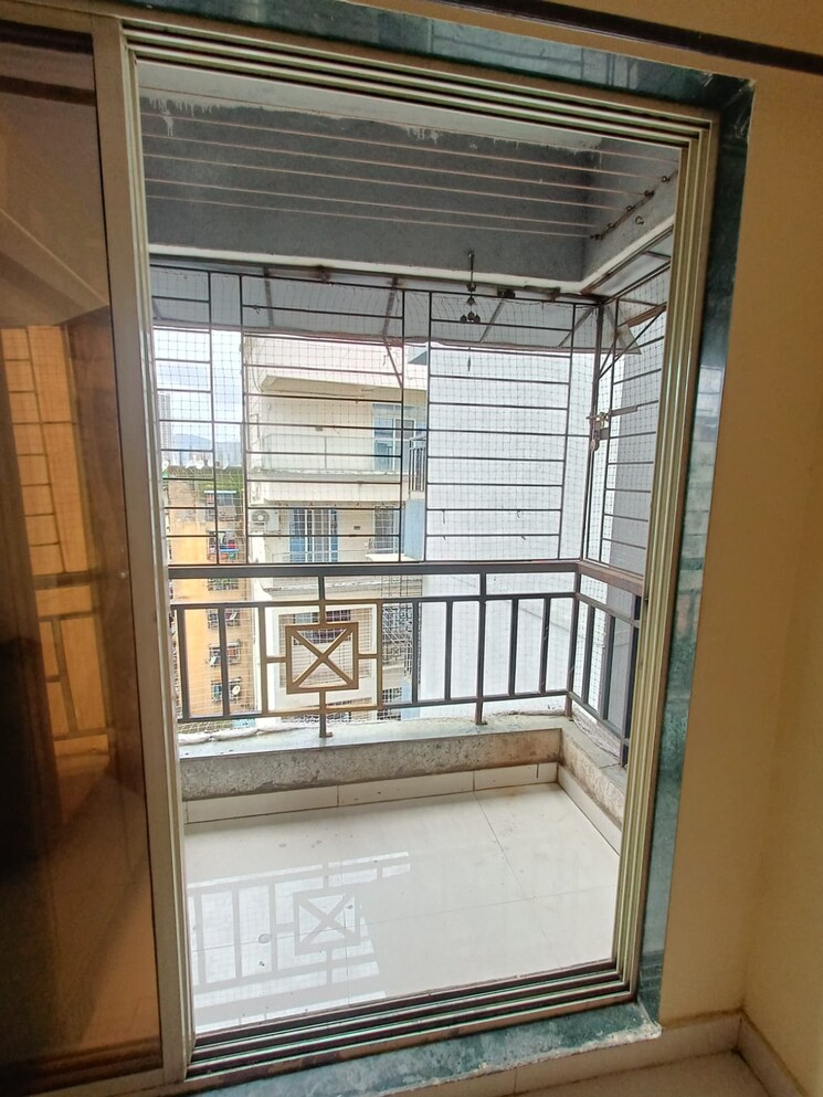 Balcony, devakibai-sadan 1 Bedroom 450 Sq.Ft. Apartment In Balkum Pada Thane 9049551