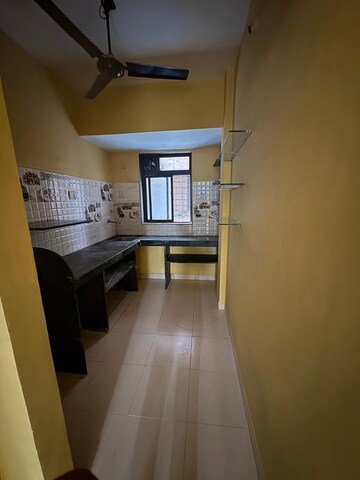 Kitchen in 1 BHK Apartment at Seawoods Sector 50 – for Rent